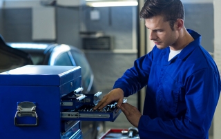 Mechanic working with modern machines