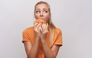 girl-eating-junkfood-donut